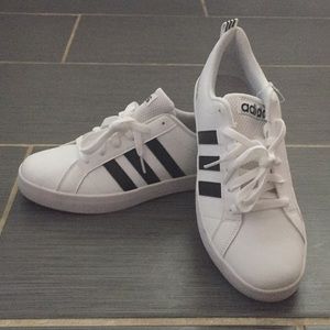 Black and white adidas-9 never worn!